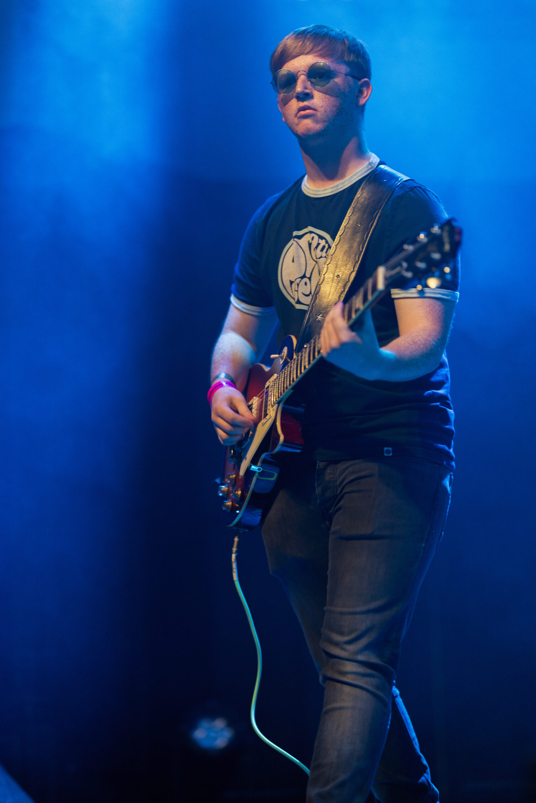 Blue Sunglasses Guitar Player